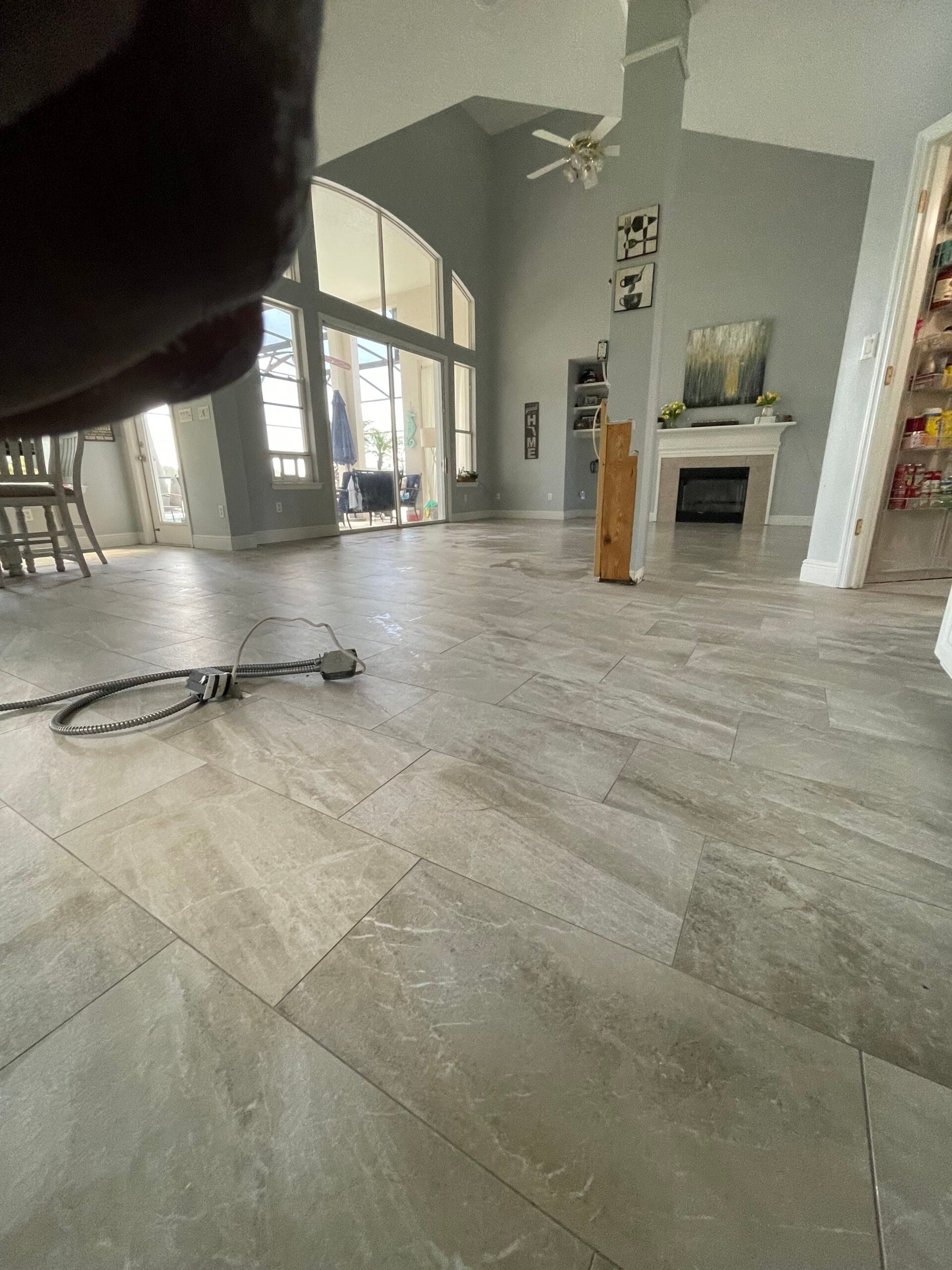Gray large-format tile flooring in a living room