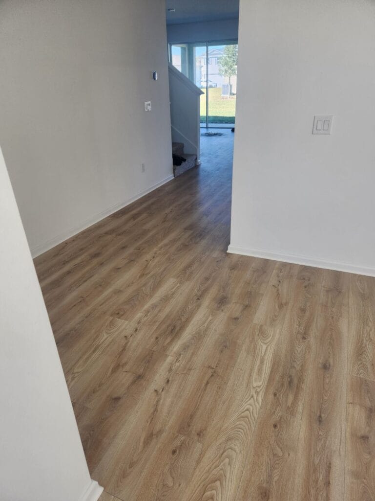 Wood-look vinyl plank flooring in a hallway
